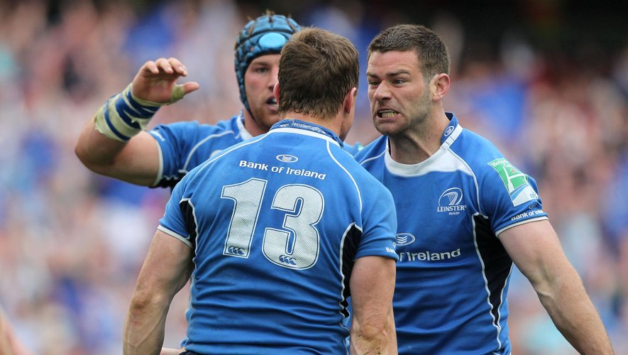 Leinster's Brian O'Driscoll (C) celebrates with teammates Gordon D'Arcy (R) and Sean O'Brien (L) on April 30, 2011 after scoring a try against Toulouse during their European Cup semi-final match at the Aviva Stadium