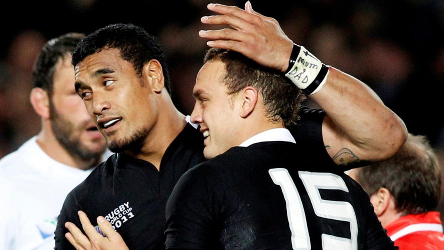 New Zealand All Blacks' Jerome Kaino (L) and Israel Dagg celebrate a try during their Rugby World Cup Pool A match against France at Eden Park in Auckland 