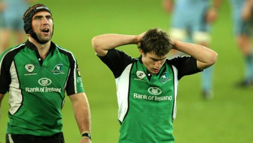 Connacht Rugby's captain John Muldoon (left) and Ian Keatley stand dejected as they lose