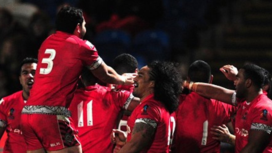 Tonga celebrate after Willie Manu's try