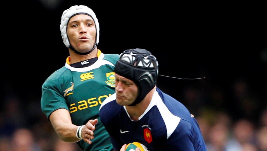 South Africa's Gio Aplon clashes with France's Julien Bonnaire during their international rugby match at Newlands in Cape Town