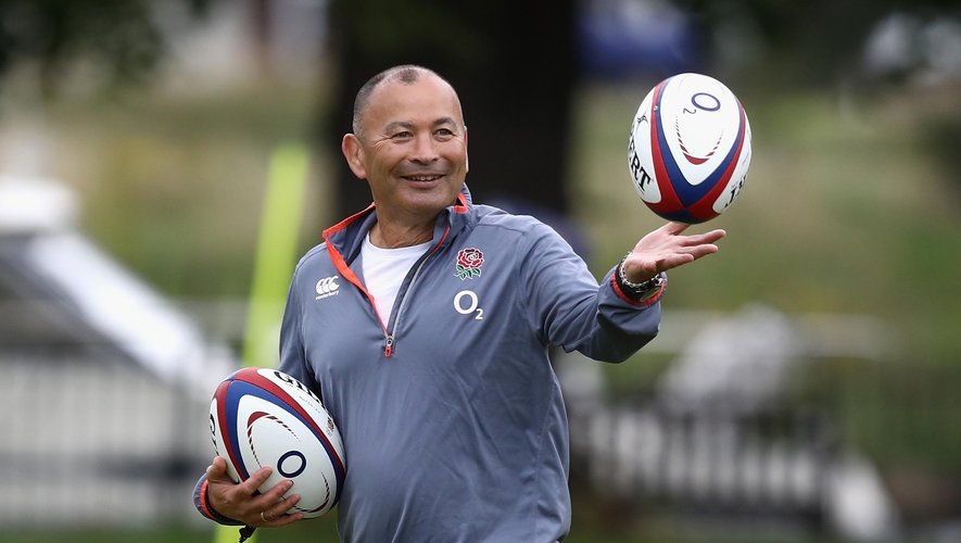 Eddie Jones, the England head coach catches the ball during the England training session