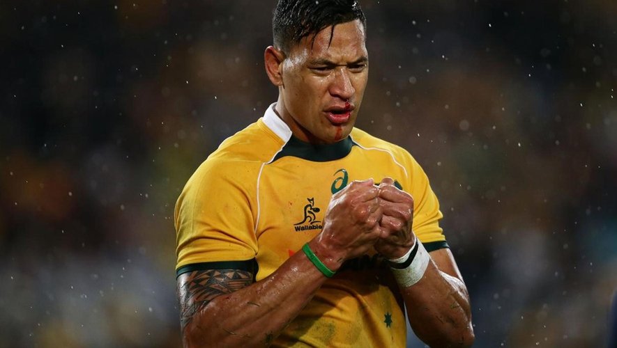 Israel Folau of the Wallabies attends to a face injury after a cillision with Nic White during The Rugby Championship match between the Australian Wallabies and the New Zealand All Blacks at ANZ Stadium on August 16
