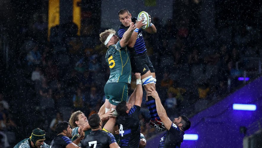 Argentina's Santiago Grondona (R) and Australia's Matt Philip fight for the ball during the 2020 Tri-Nations rugby match between the Australia and Argentina in Sydney on December 5, 2020. (